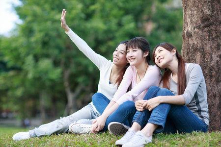 Asian young girls at campusの写真素材