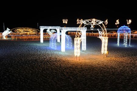 Decorative archway frame and horse on the beachのeditorial素材