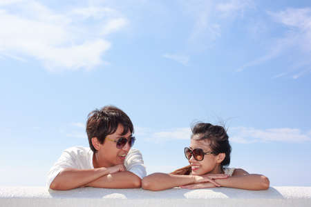 Asian people on the seasideの写真素材