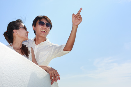 Asian people on the seasideの写真素材