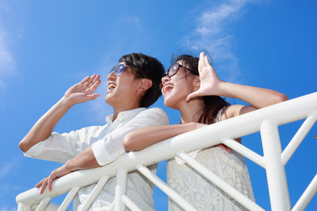 Asian people on the seasideの写真素材