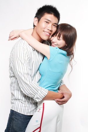 Portrait of a young couple embracingの写真素材