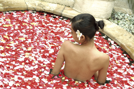 Young woman taking a showerの写真素材