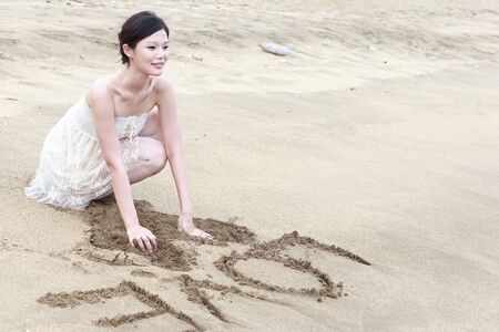 Portrait Of Asian Young Woman at beachの写真素材