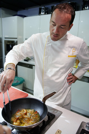 chef cooking in kitchenのeditorial素材