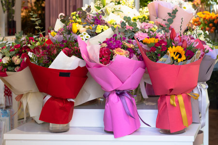 Finished bouquets on the table in the shop. Flower shop conceptの写真素材