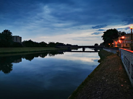 Dark clouds over Opole. Bridge on the Odra River in Opole. Storm clouds over the river.