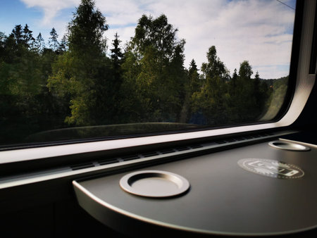 Symbol of wireless charging placed on the table in the train. Wireless charging.の写真素材