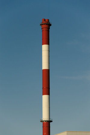 Industrial chimney against the background of blue sky. Bytom Silesia Polandの写真素材