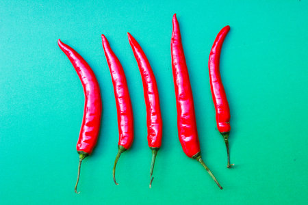 This chili row ongreen background.