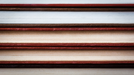 The sort of book pages, hardcover textbook medicine manufactured by hand by hand.の写真素材