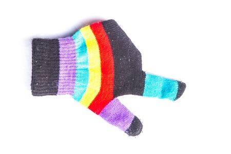 Multi-colored gloves and a symbol of the hand.の写真素材