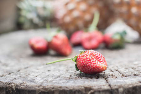 Strawberry fresh and tasty on the old wooden background.の写真素材