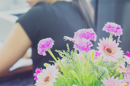 Flowers in the office. Soft Focus.の写真素材
