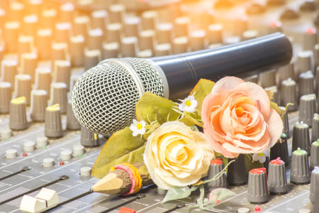 Cross process color photo of a microphone on amplifier equipment.Vintage Styleの写真素材