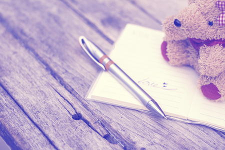 Brown teddy bears with Book reminders.Effects filters.の写真素材