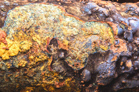 Detail and texture of the Rusty steel water supply pipe.