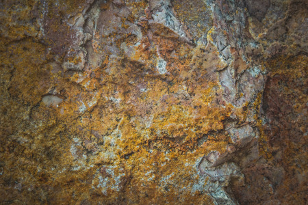 Stone abstract background with a pattern caused by water erosionの写真素材