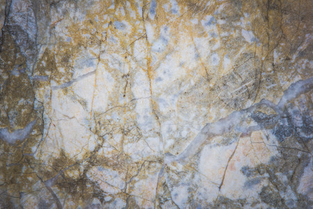 Stone abstract background with a pattern caused by water erosionの写真素材