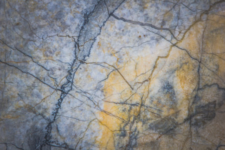 Stone abstract background with a pattern caused by water erosionの写真素材