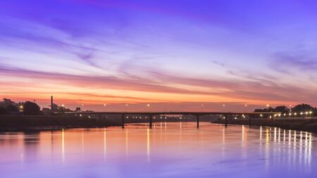 Sunset Bridge over the river in Thailand.の写真素材