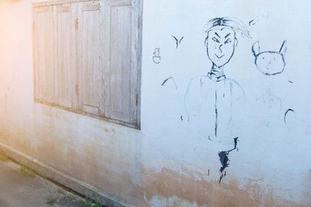 Drawing lines on a cement wall.の写真素材