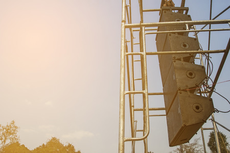 Speakers hanging outside.の写真素材