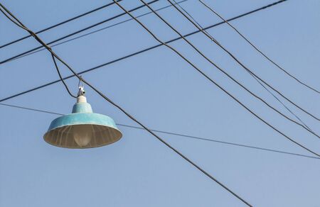 Old vintage lamps illuminate the park.の写真素材
