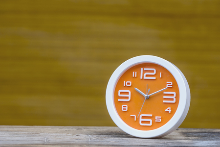 Orange clock.の写真素材