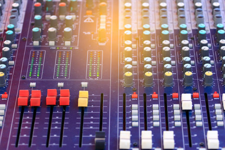 Mixer level control knob in the control room and sound recorder.