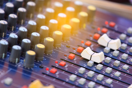 Mixer level control knob in the control room and sound recorder.