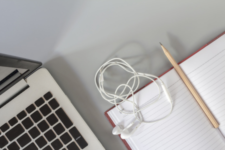 Pencil on notebook paper gray background.の写真素材