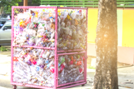 Blurring the recycling bins. Green.の写真素材