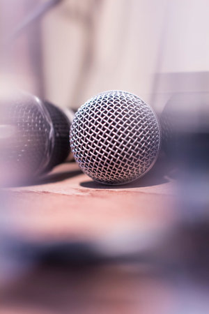 Soft focus with conference room microphone.