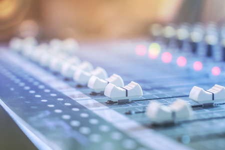 Closeup of a microphone button control system engineering professionals. Bokeh background.の写真素材