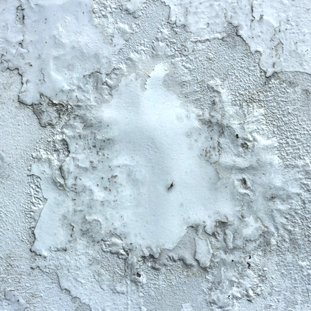 Cracks in the cement wallの写真素材