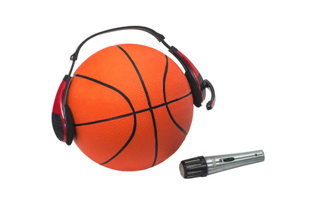 Basketball with headphones and a microphone on a white background.の写真素材