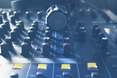 Classic microphone on mixer, recording equipment.の写真素材