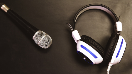 Microphone and headphone background blackboard.の写真素材