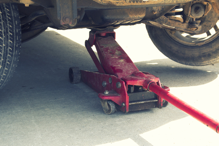 Crocodile Lifting Car for car repairs to view the undercarriage of the car.の写真素材
