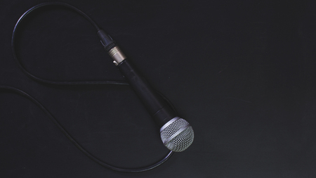 Microphone and line on the blackboard.の写真素材