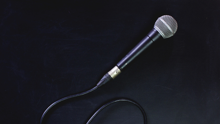 Microphone and line on the blackboard.の写真素材