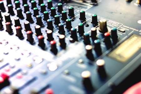 Button to adjust the volume control of the audio mixer.