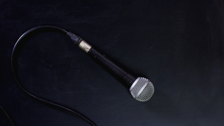Microphone and line on the blackboard.の写真素材