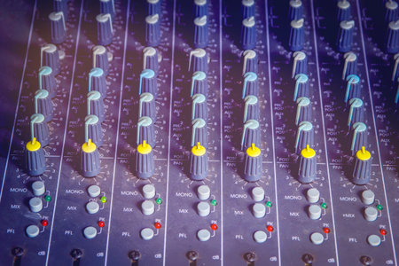 Audio mixing console knobs.