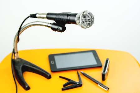 The microphone on the table wooden yellow.の写真素材