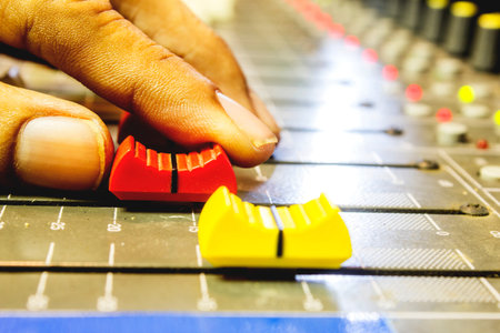 Hand of Sound Engineering Adjustable Slide Sound Control.