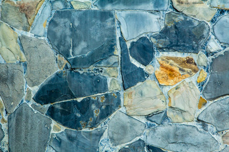 Striped stone wall abstract background.