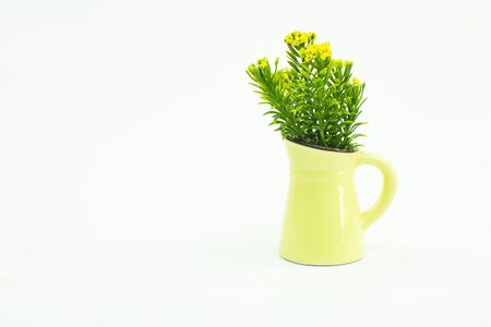 Vintage artificial flowers in a vase.の写真素材