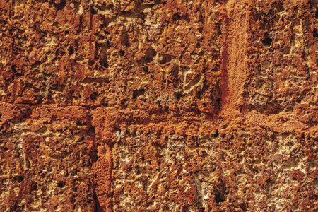 The old wall is made of red bricks.Texture of a wall made of antique bricks.Vintage red brick wall.の写真素材